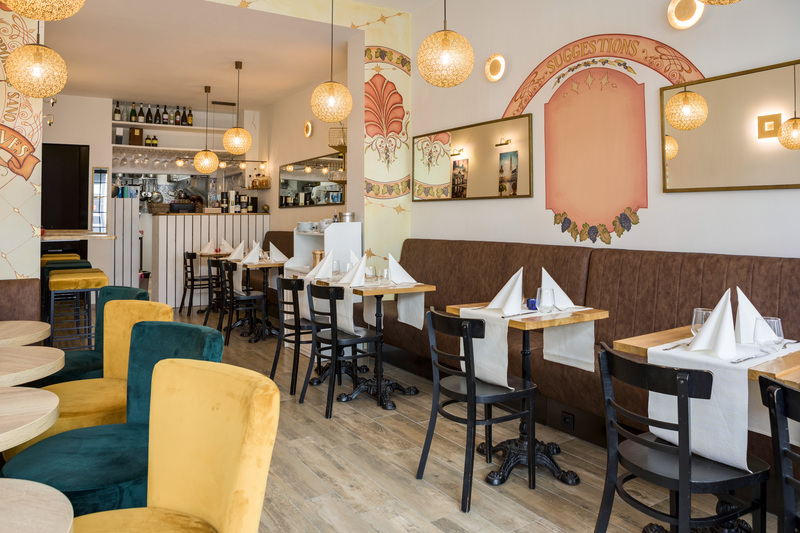 Salle intérieure cosy du restaurant Jardin des Olives à Bruxelles