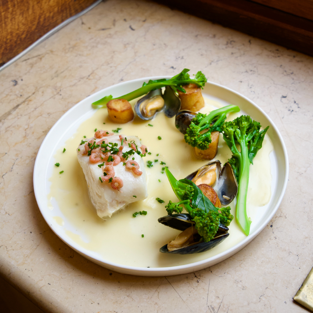 Poisson du jour, sauce beurre blanc et moules à The Brasserie